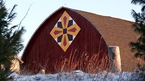 A barn quilt wraps passersby with the visual equivalent. Shawano County Is The Barn Quilt Capital Of Wisconsin And Maybe The Country