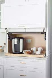 Kit includes hardwood tambour with a fabric backing, spring tension adjustment for full control of tambour door movement, a wooden hand pull and a face frame mounting track system. Kitchen Coffee Station In Appliance Garage Cabinet Transitional Kitchen