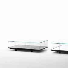 Modern and rustic, with a hint of traditional style, this table meets your storage needs with finesse. Contemporary Coffee Table Collector Glas Italia Glass Rectangular With Storage Compartment