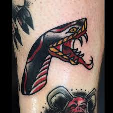 Different kinds of floral designs idea make up great tattoo designs that withhold significant meaning and significance to the bearer of the tattoo. Traditional Snake Tattoo Head Novocom Top