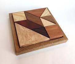 Puzzles and products showing a box are instock and can ship the next business day. Wood Puzzle Brain Teaser 10 Piece Geometric Jigsaw Etsy In 2021 Wood Puzzles Wooden Puzzles Wood