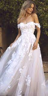 See more ideas about wedding, wedding dresses, flower centerpieces wedding. Fashion Ahead Wedding Gowns A Range From The Make Floral Lace Blush Madi Lane Off Shoulder Wedding Dress Wedding Dresses Blush Wedding Dresses