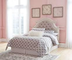 The opposite of tufted headboards, upholstered panel headboards don't have any seams. The Realyn Chipped White Full Upholstered Panel Headboard Available At Jaxco Furniture Serving Jacksonville Fl And Surrounding Areas