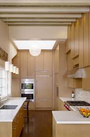 It is a bulkhead, constructed out of the surrounding wall to encase the cabinet tops. 37 Kitchen Ceiling Design Ideas Sebring Design Build