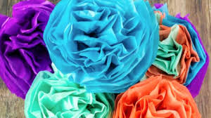 Cut thin strips from green craft paper to create stems. How To Make Mexican Paper Flowers For Cinco De Mayo Decorations Kab