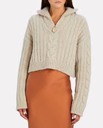 Rib knit neck, cuffs and hem. Nanushka Sweater