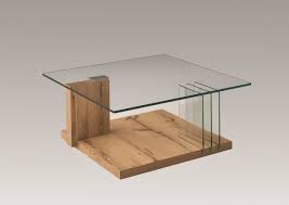 This shining, futuristic, and sleek coffee table serves as a sound system, refrigerator, party hub, and storage space for any room in your home. Venjakob Glass Coffee Table With Newspaper Holder Old Creamery Furniture