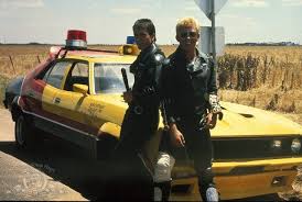 When a member of a deadly biker gang escapes in a pursuit special, the best officer in the mfp, max rockatansky, is sent to chase him down. Mad Max 1979 Revisited George Miller S 1979 Film
