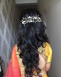Hairstyles in a long gown can be beautiful. Wedding Hairstyle Ideas For Mehndi Sangeet Wedding Reception Bridal Look Wedding Blog