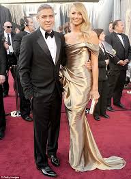 George and amal clooney arrive to dinner on a speedboat in lake como. Oscars 2012 George Clooney S Girlfriend Stacy Keibler Is A Trophy Girlfriend In Golden Gown Daily Mail Online