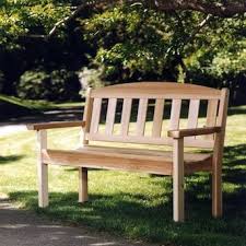 An outdoor bench in your garden or patio can serve as a space for entertaining guests or as a nook for relaxing. All Things Cedar 52 In W X 34 In L Natural Cedar Garden Bench Lowes Com In 2020 Wooden Garden Benches Garden Bench Plans Garden Bench