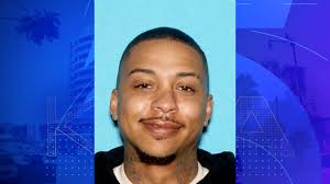 Man arrested, 2 sought in deadly South Los Angeles street takeover