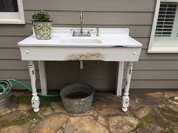 The sink in the photo uses cold water from the hose, with the waste routed into the drain for the outdoor shower behind it. Great Outdoor Sink From A Vintage Porcelain Sink Hook Up Garden Hose To Outdoor Connection Waschbecken Garten Aussenwaschbecken Gartenwaschbecken