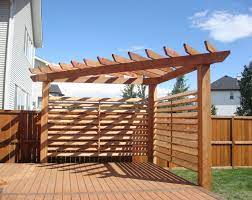 Pergolas And Privacy Walls Busy Beaver Construction In 2021 Pergola Plans Building A Pergola Deck With Pergola