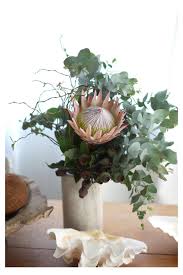 With a realistic look and feel silk flowers are used to make wedding bouquets, wedding decorations and home decorations. Protea Vase Arrangement Mermaid Party King Protea Blue Gum Tortured Will In 2021 Creative Flower Arrangements Unique Flower Arrangements Faux Flower Arrangements