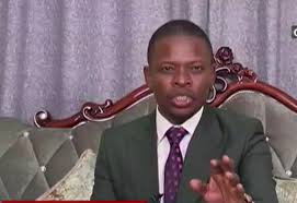 Greenish coloring by his right eye and upper right lip area. Bushiri Holds Online Church Service Enca