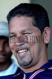 Former West Indian cricketer Larry Gomes, coach of the US under-19 cricket  team, caught in...