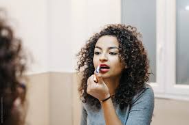 Video search results for woman lipstick pretty. Pretty Woman Putting Lipstick At Mirror By Javier Diez Stocksy United