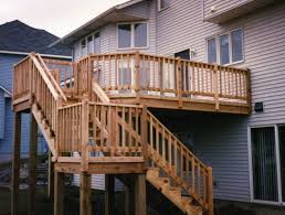 How To Build A Deck On The 2nd Story Of Your House Ehow Building A Deck Building A Floating Deck Deck Steps