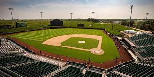 A giant, outdoor screen was set up adjacent to the field with seating, concession, and parking along left and center field. Wpybdscx5yzivm