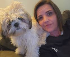 Man picking up food in unusual way