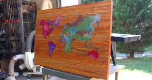 This led epoxy resin wall art contains purple photoluminescent powder (glow powder) in the bottom resin layers. Diy Woodworking Resin Wood World Map Wall Art