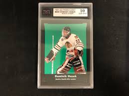 The player's name and position appear in the top white border, while the team name is given in the bottom white border. 1991 92 Parkhurst 449 Dominik Hasek Rookie Leader 10 Gem Mint