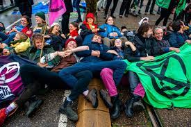The extinction rebellion are a group of climate change campaigners who demand the government 'tell the truth', 'act now' and look 'beyond politics'. Extinction Rebellion S Plan To Save The Climate With Civil Disobedience Vox