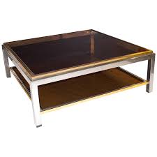 Explore durability certified glass coffee you can find a wide variety of coffee tables on various online sites that come in different shapes such as abstract, oval, rectangle, round, and square. French Signed Maison Charles Square Brass And Chrome Coffee Table Smoked Glass For Sale At 1stdibs