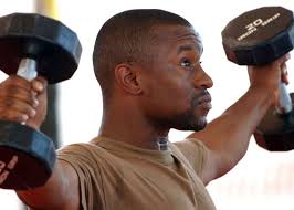 Equipment Operator 2nd Luis Martinez competes in Camp Lemonier Labor Day  Strong Man Competition.