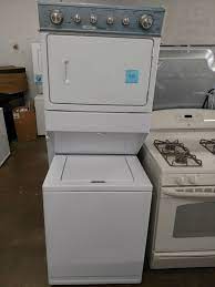 Stackable washers and dryers are ideal for smaller homes, apartments, and condos where there may not be enough space for a dedicated laundry area. White Stackable Washer Dryer Baltimore Used Appliances