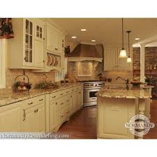 Every time we entertain on the deck, our guest rave about the space and we always mention how pleased we were to work with. Kitchen Remodeling Renovation Designers In Chicago With Normandy French Country Kitchens French Country Kitchen Cabinets Country Kitchen Backsplash