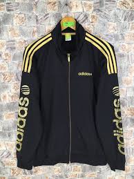 Black And Gold Nike Jacket Clothing Jacket Adidaswindbreaker Tommywindbreaker Nikewindbreaker Adidaswomenjacket Adidasac Adidas Three Stripes Adidas Windbreaker Windbreaker Jacket