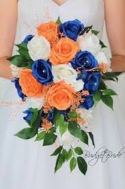 Its an essential part for wedding ceremony,mothers day and other special events materials: Cascading Wedding Brides Bouquet In With Royal Blue Peach Apricot And White Roses Accented Blue Wedding Flowers Wedding Bouquets Bride Bridal Wedding Flowers