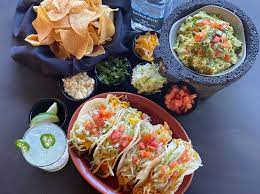 Individual chips topped with refried beans and a blend of monterey jack and cheddar cheese classic taco salad. Uncle Julio S It S Finally Taco Tuesday Celebrate At Facebook