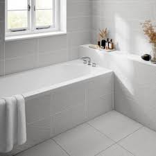 White on white tile fixtures with gray planked wood flooring. Dominican White Wall Bathroom Tiles 250 X 500mm Per Box