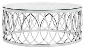 A rectangular tabletop is elevated by metallic chrome finished supports. Fox9060a 2bx Safavieh