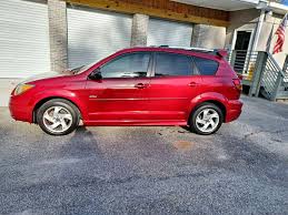 Image result for Red Brown 2004 Pontiac