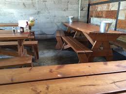 This is an example of a farmhouse gravel landscaping in austin with a fire pit. Picnic Table Indoor Seating Picture Of Kenny Zuke S Bagelworks Portland Tripadvisor