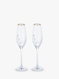 Crystal champagne flutes are explicitly designed to enhance the drinking of champagne. Champagne Flutes Saucers John Lewis Partners