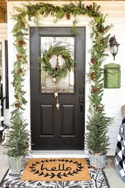 Stylish christmas wreath with fir branches and lights at front w. Christmas Wreath Ideas 25 Christmas Wreath Tutorials