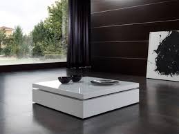 This rectangular coffee table in high gloss black has a modern, elegant look and feel, and will complement the furniture in your home. Raf Contemporary Coffee Table In White Or Black High Gloss Finish With Elevating G Centre Table Living Room White Coffee Table Modern Center Table Living Room