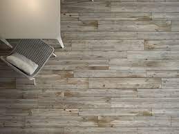 An understated, minimal look to enhance modern architecture, with a subtle touch of class. Porcelain Stoneware Flooring With Wood Effect High Tech Woods Quercia Petraea By Ariostea