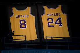 Los angeles lakers jersey logo national basketball spurs drawing logo nba logos and uniforms of the los. Kobe Bryant S Retired Lakers Jerseys Are Lit Up Inside The Staples Centre At The Grammys Business Insider