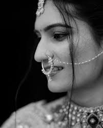 A wonderful Marathi couple, embodying simplicity and grace, looking  absolutely stunning in their traditional attire. The serene backdrop of the  Nashik Trimbak hills complements their natural beauty, with every shot  capturing the