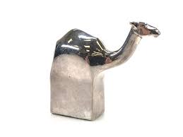 It is traditionally considered to be one species, giraffa camelopardalis, with nine subspecies. Lot 2pc Dansk Silver Plate Giraffe Camel Figurines
