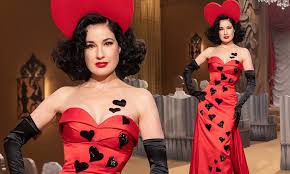 The american burlesque star, 48, became the third celebrity to be revealed on the show after the judges decided to save knickerbocker glory. Dita Von Teese Is The Queen Of Hearts In A Satin Red Gown At Moschino S Milan Fashion Week Show Daily Mail Online