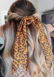 A fantastically casual yet cute looking hairstyle, the shaped curls can be parted on either side to suit your mood of the day. 45 Pretty Ways To Style Your Hair With A Scarf