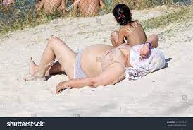 Old Fat Woman On Beach On Stock Photo 693938743 | Shutterstock