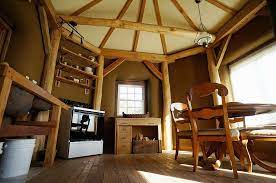 We would then live in this for a year or two while we save and then build the main residence (straw bale as well, but not a shop, an actual house) post and beam with straw bale infill. Round Pole Timber Framing Google Search Cob House Interior Timber Frame Homes Straw Bale House